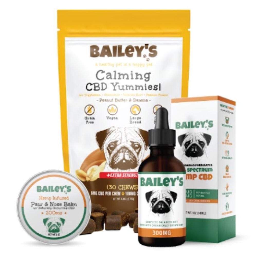 Bailey's CBD product range: Calming CBD Yummies chews, a 300 mg CBD oil dropper bottle, a hemp CBD carton, and a paw and nose balm tin